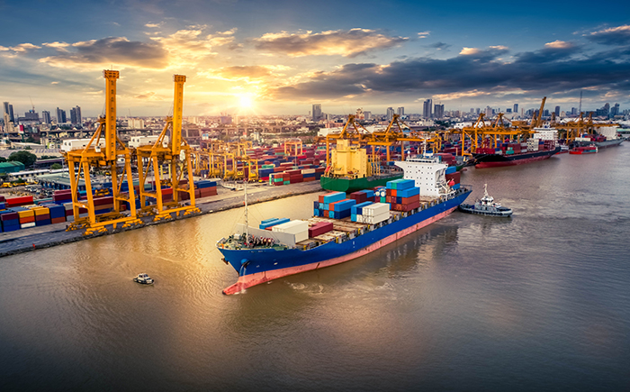 Container ship at port sunrise